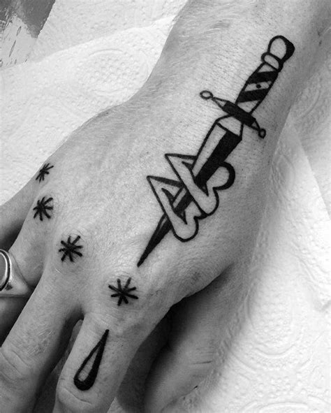 hand tattoo ideas man|simple hand tattoos for men.